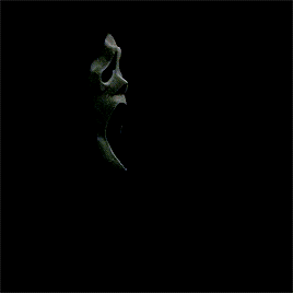 Ghostface from the movie Scream. The background is black, before he turns to the camera and opens a door, letting light in.