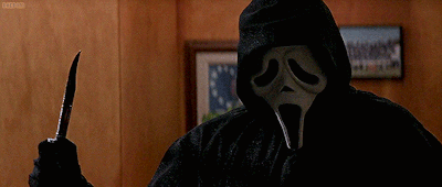 Ghostface from the movie Scream. He is holding a bloody knife and looking down at someone. The background is an orange-brown.